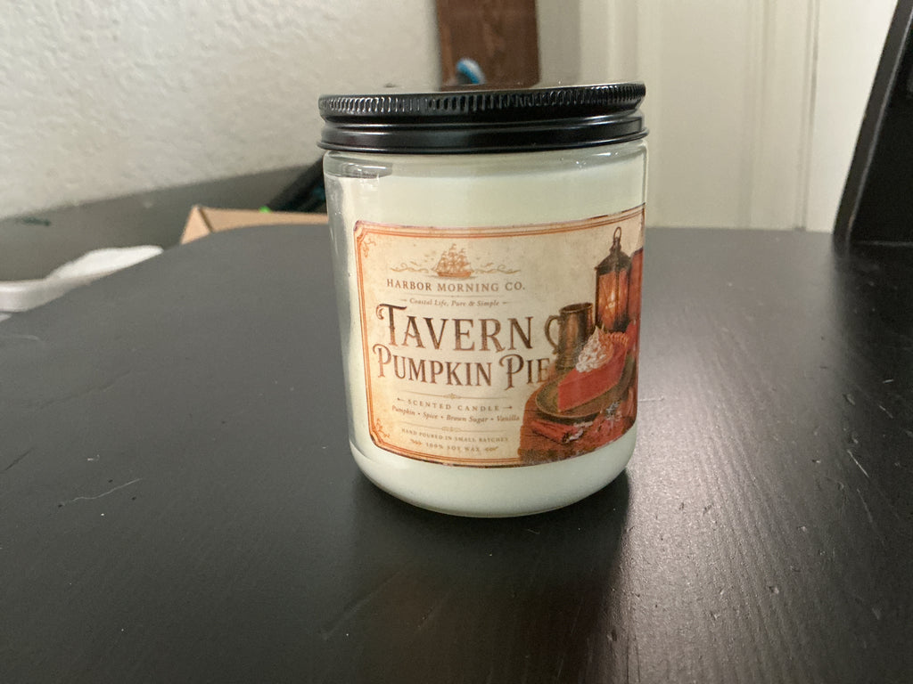 Tavern Pumpkin Pie 8 oz soy candle in a cozy autumn setting