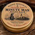 Minute Man Trading Post beard balm on a wooden table