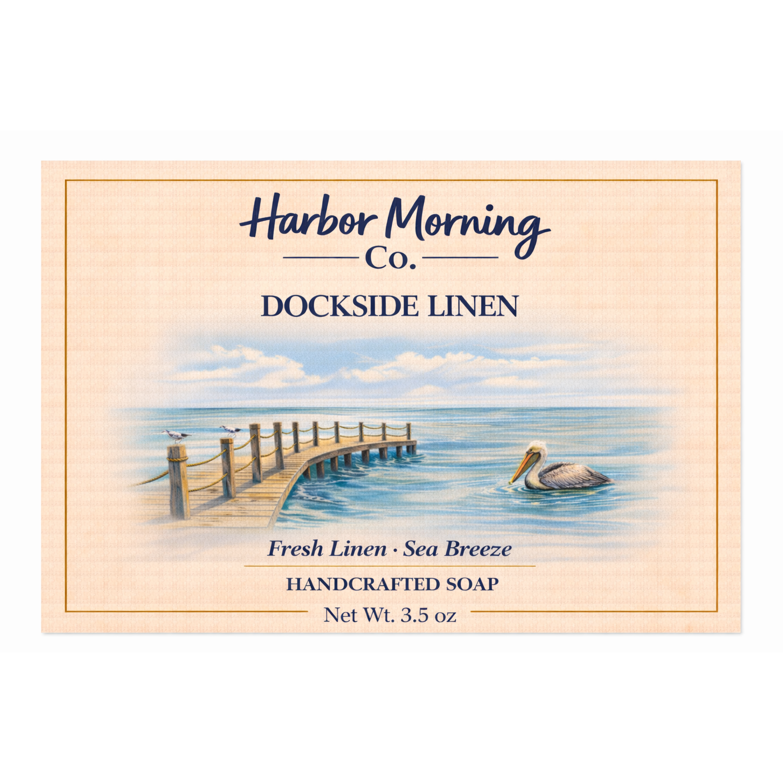 Harbor Morning Co. Dockside Linen handcrafted goat milk soap label featuring a pier reaching into the ocean with a pelican in the water — fresh linen and sea breeze scent