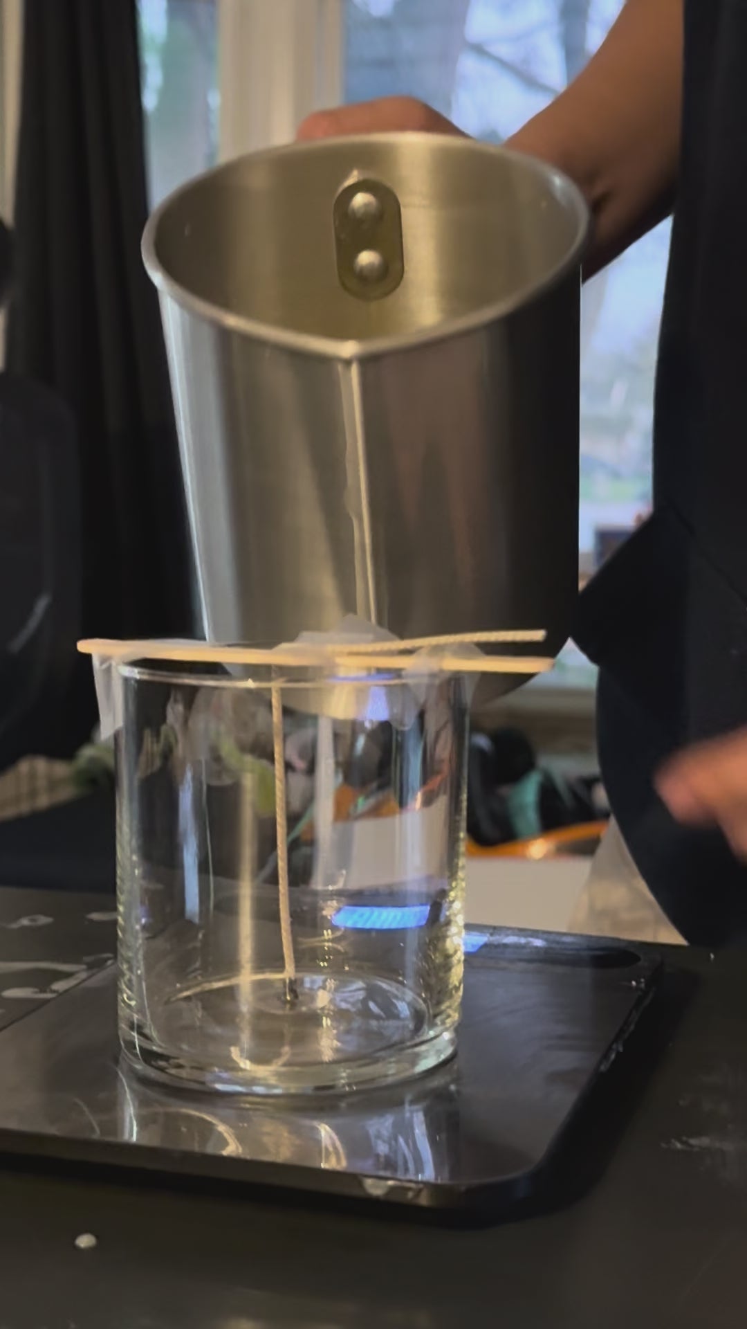 Harbor Morning Co. first pour — melted coastal soy wax being poured for the very first Founder Batch candle