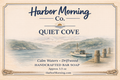 Harbor Morning Co. Quiet Cove handcrafted goat milk soap label featuring calm cove waters, driftwood, and a small fishing boat tied to a pier